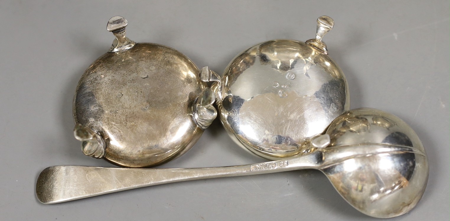 A George V silver octagonal hot water pot, a.f. and six other items of small silver including pair of salts, caster, cream jug, bowl and sauce ladle, 23.4oz.